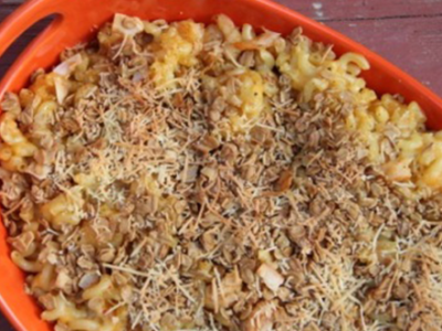 Shrimp macaroni and cheese with granola topping.