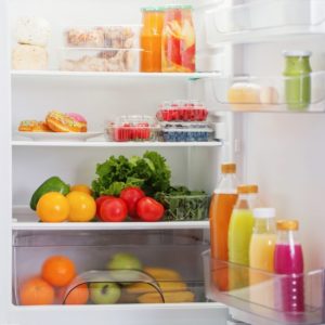 Open refrigerator with food and drinks