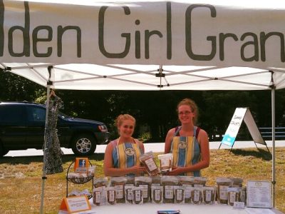 Jacquie with Golden Girl Granola tent at the Shirley Farmers' Market.